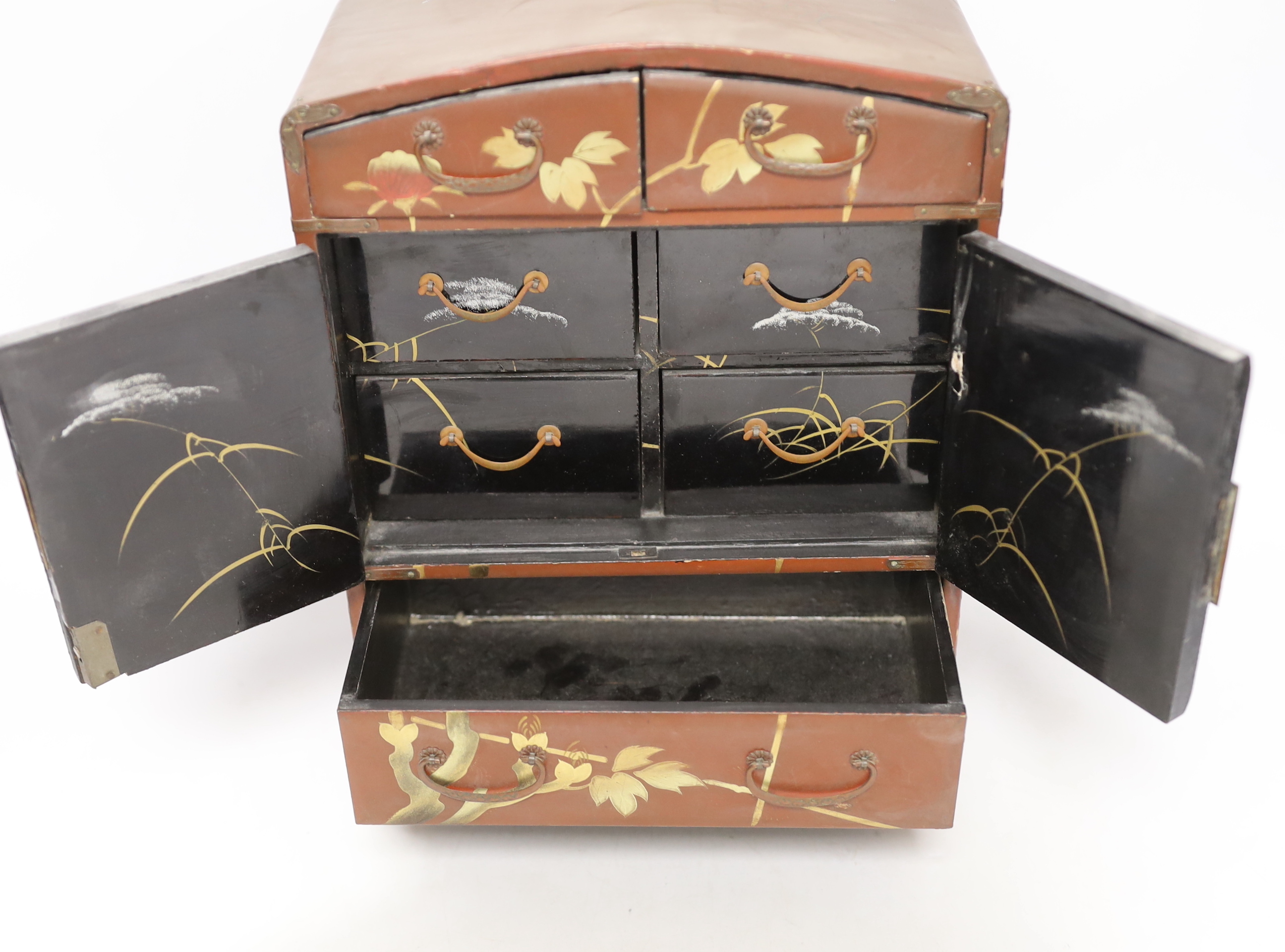 A Japanese lacquer table cabinet, 28.5cm high